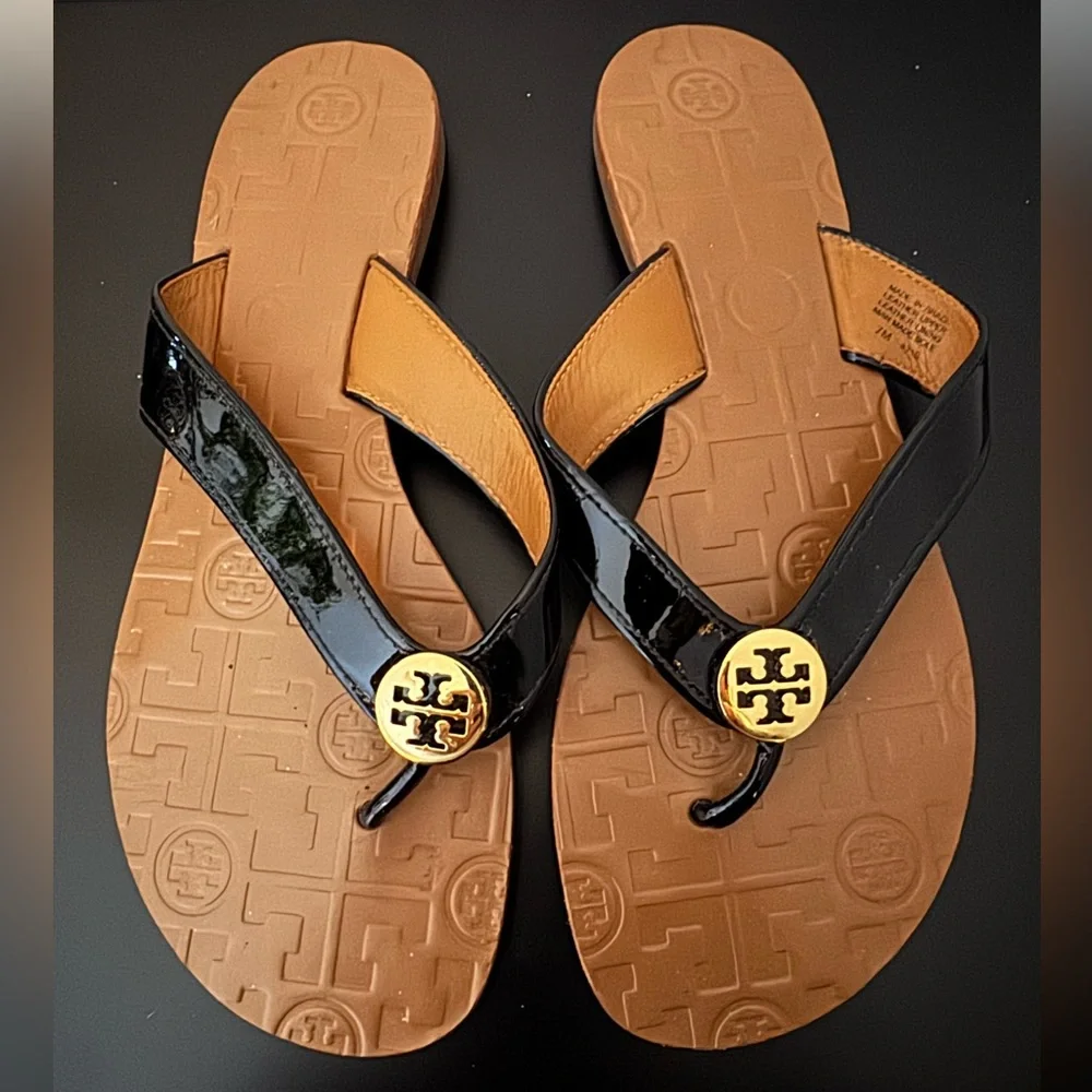 Tory Burch Black and Tan Flip Flops - Picture 2 of 3